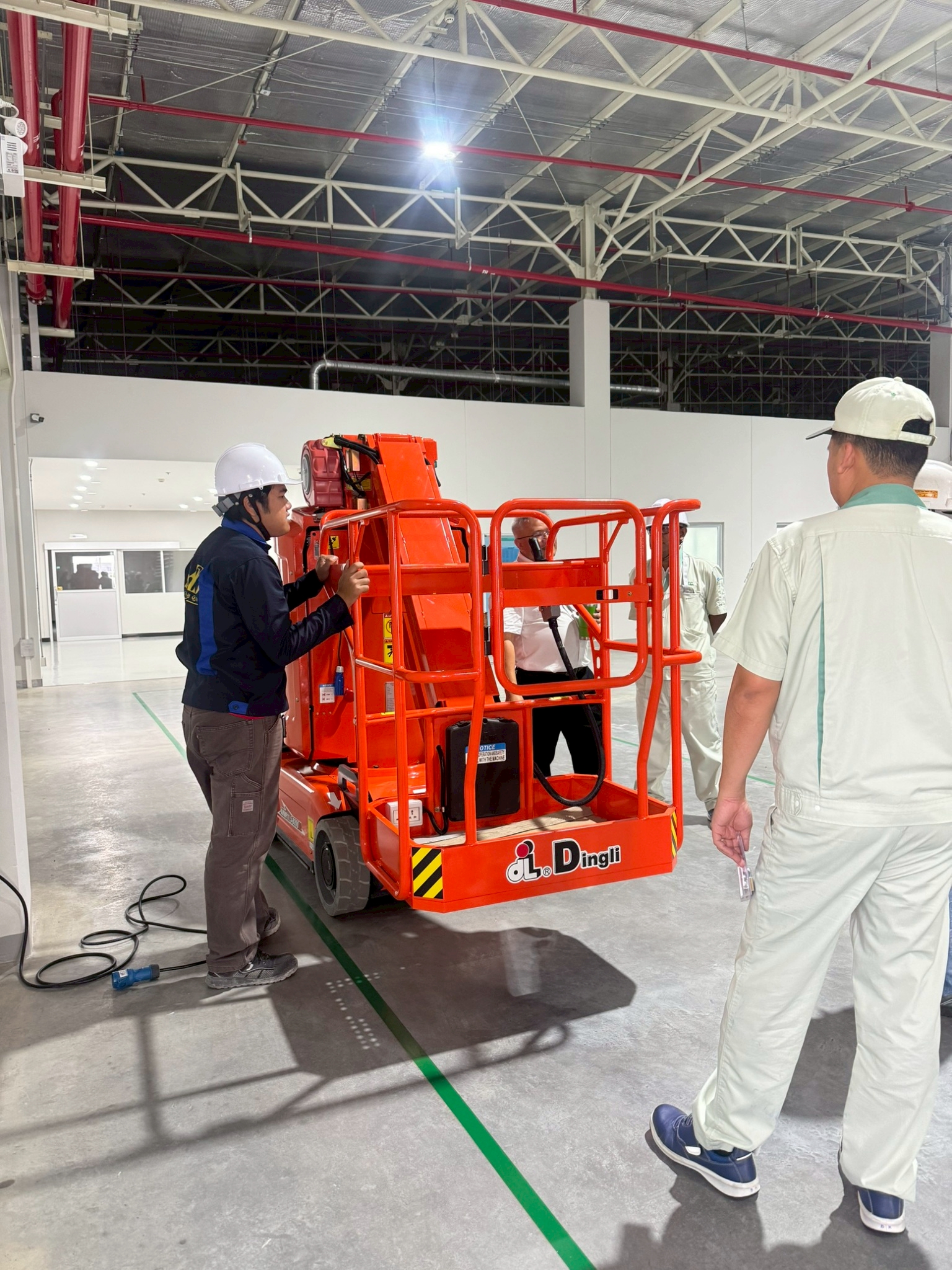 Delivering International-Standard Safety with the AMWP11.5-8200AC Vertical Mast Lift